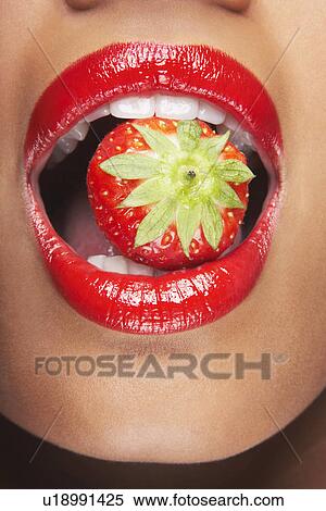 Woman's mouth with strawberry View Large Photo Image Stock Photography - Woman's mouth with strawberry. Fotosearch