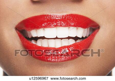 Woman's teeth and mouth with red lipstick View Large Photo Image Stock Photo - Woman's teeth and mouth with red lipstick. Fotosearch