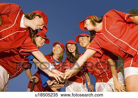 Women's softball team in huddle low angle view View Large Photo Image Stock Photography - Women's softball team in huddle low angle view. Fotosearch