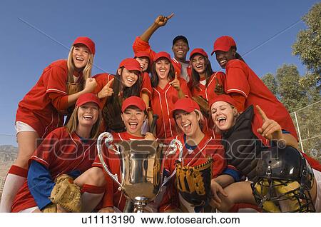 Women's softball team with trophy portrait View Large Photo Image Stock Image - Women's softball team with trophy portrait. Fotosearch