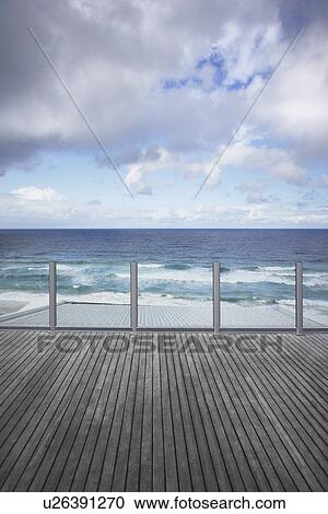 wooden dock and moody sky View Large Photo Image Stock Image - wooden dock and moody sky. Fotosearch