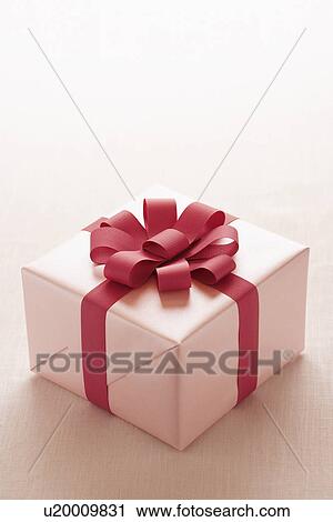 Wrapped Christmas present View Large Photo Image Stock Image - Wrapped Christmas present. Fotosearch