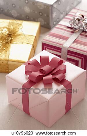 Wrapped Christmas presents View Large Photo Image Stock Image - Wrapped Christmas presents. Fotosearch