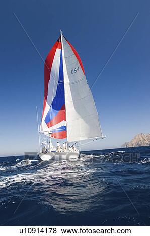 Stock Photo - Yacht on ocean back view. Fotosearch