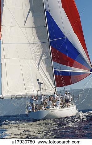 Yacht on ocean with full sail back view View Large Photo Image Stock Image - Yacht on ocean with full sail back view. Fotosearch