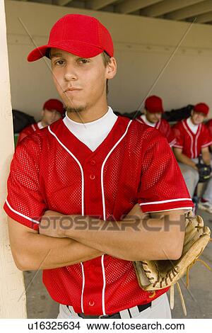 Young baseball player on field (portrait) View Large Photo Image Picture - Young baseball player on field (portrait). Fotosearch