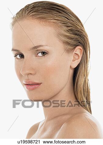 Stock Image - Young Blond Woman with wet hair portrait. Fotosearch