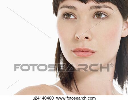 Stock Image - Young Brunette Woman close up. Fotosearch