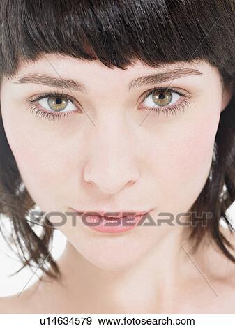 Stock Photo - Young Brunette Woman portrait head shot. Fotosearch