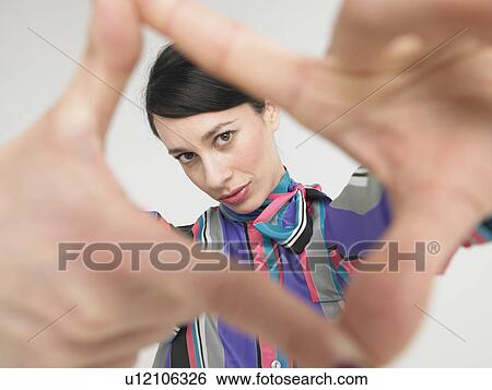 Young Businesswoman Making Finger Frame View Large Photo Image Stock Photograph - Young Businesswoman Making Finger Frame. Fotosearch