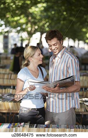 Young Couple at Bookstall View Large Photo Image Stock Photography - Young Couple at Bookstall. Fotosearch