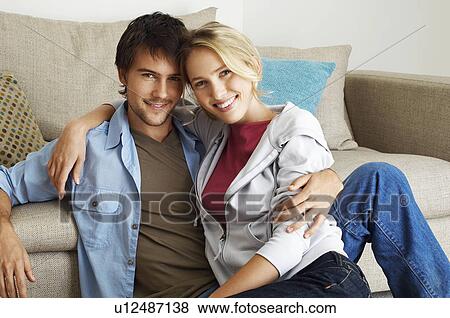 Stock Photo - Young Couple at Home. Fotosearch