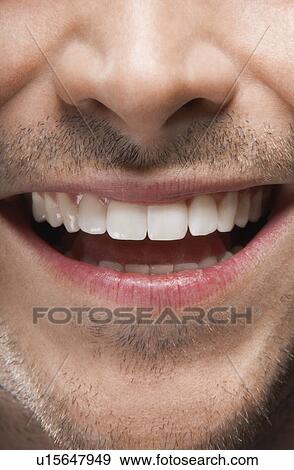 Stock Photo - Young Man smiling. Fotosearch