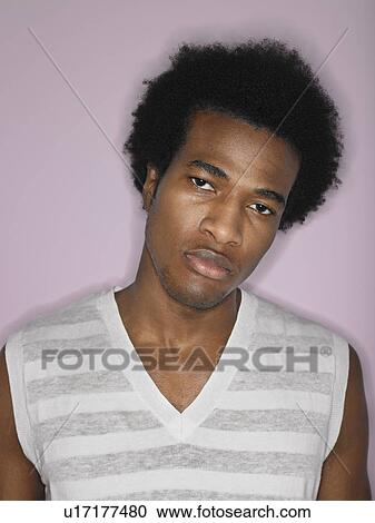 Stock Image - Young Man Wearing Tank Top. Fotosearch