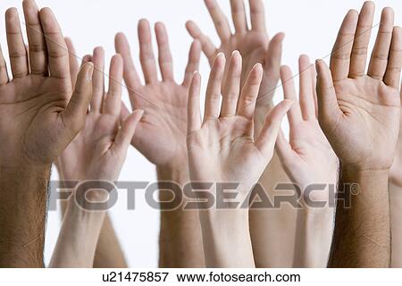 Stock Photo - Young men and women raising hands close-up of hands. Fotosearch