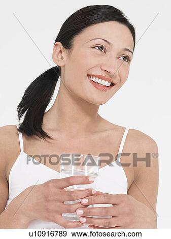 Young Woman in underwear Drinking glass of Water View Large Photo Image Stock Photo - Young Woman in underwear Drinking glass of Water. Fotosearch
