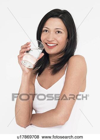 Young Woman in underwear Drinking glass of Water View Large Photo Image Stock Photo - Young Woman in underwear Drinking glass of Water. Fotosearch