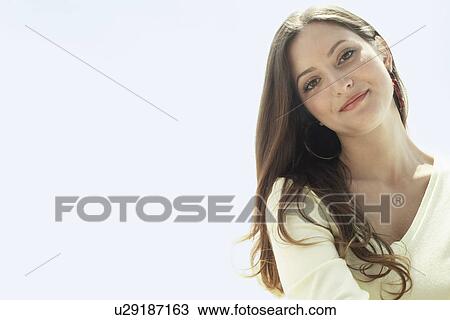 Stock Image - Young woman portrait.. Fotosearch