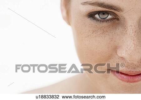 Young woman with freckles close-up cropped View Large Photo Image Stock Image - Young woman with freckles close-up cropped. Fotosearch