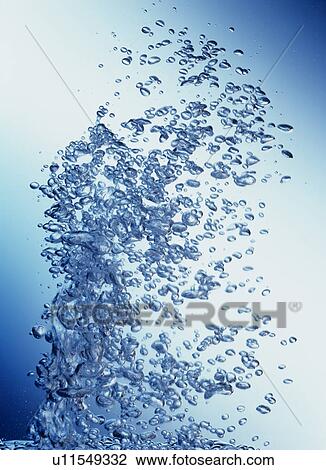 Stock Image - Air Bubbling Upward Through Water. Fotosearch