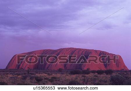 Stock Image - Australia Uluru at dusk. Fotosearch