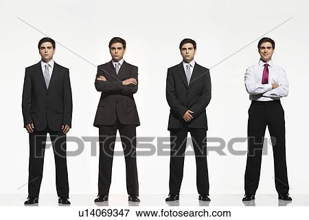 Businessmen standing side by side arms crossed by side clasped digitally enhanced View Large Photo Image Stock Photo - Businessmen standing side by side arms crossed by side clasped digitally enhanced. Fotosearch