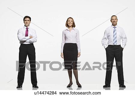 Businesspeople standing side by side arms crossed by side in pockets View Large Photo Image Picture - Businesspeople standing side by side arms crossed by side in pockets. Fotosearch