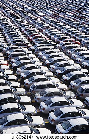 Stock Photo - Cars parked in rows elevated view full frame. Fotosearch