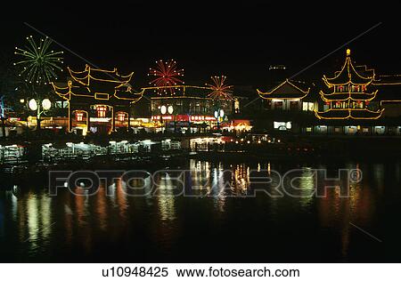 China Shanghai Yu Yuang Gardens the teahouse ancient shopping area and lake at night View Large Photo Image Stock Photography - China Shanghai Yu Yuang Gardens the teahouse ancient shopping area and lake at night. Fotosearch