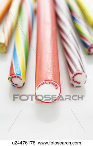 Stock Photograph - Close up of rock candy sticks elevated view studio shot. Fotosearch