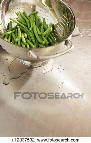 Colander of washed and prepared green beans View Large Photo Image Stock Image - Colander of washed and prepared green beans. Fotosearch
