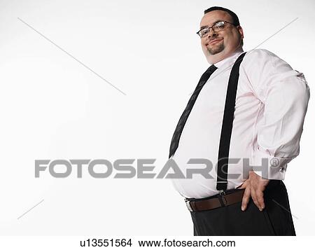 Picture - Confident overweight businessman side view. Fotosearch