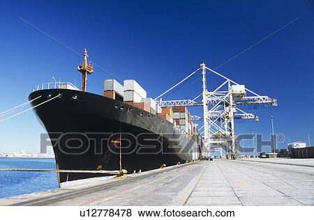 Container ship in docks View Large Photo Image Stock Photo - Container ship in docks. Fotosearch