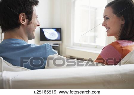 Stock Photo - Couple on Sofa. Fotosearch