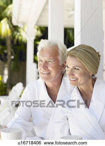 Couple sitting on verandah portrait View Large Photo Image Stock Photograph - Couple sitting on verandah portrait. Fotosearch