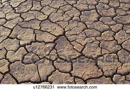 Cracked earth in desert full frame View Large Photo Image Stock Image - Cracked earth in desert full frame. Fotosearch