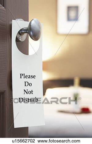 Do Not Disturb"" sign on hotel room's door View Large Photo Image Stock Image - Do Not Disturb"" sign on hotel room's door. Fotosearch