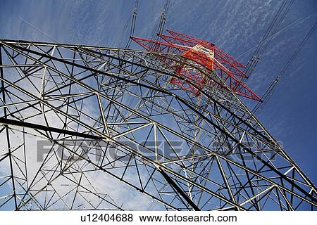 Stock Photo - Electricity pylon low angle view. Fotosearch