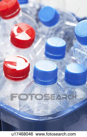Empty plastic bottles in container close-up View Large Photo Image Stock Photograph - Empty plastic bottles in container close-up. Fotosearch