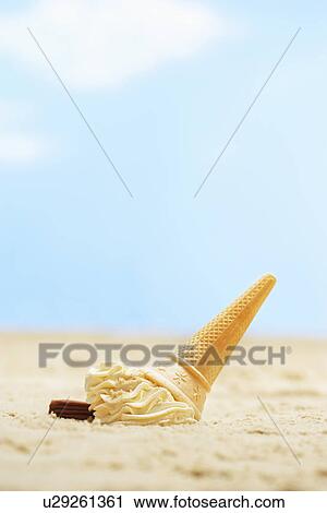 Fallen icecream in sand View Large Photo Image Stock Image - Fallen icecream in sand. Fotosearch