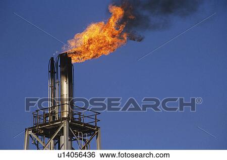 Stock Photograph - flames rising out of smoke stack. Fotosearch