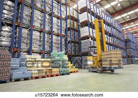 Picture - Forklift Driver in Warehouse. Fotosearch