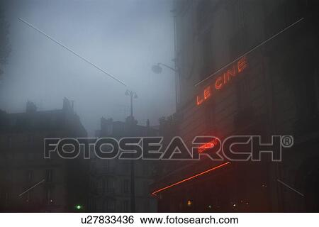 Stock Photograph - France Paris misty street at dusk. Fotosearch