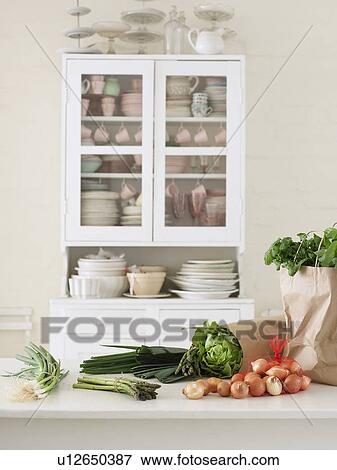 Fresh Vegetables and paper sack on Kitchen Counter View Large Photo Image Stock Photo - Fresh Vegetables and paper sack on Kitchen Counter. Fotosearch