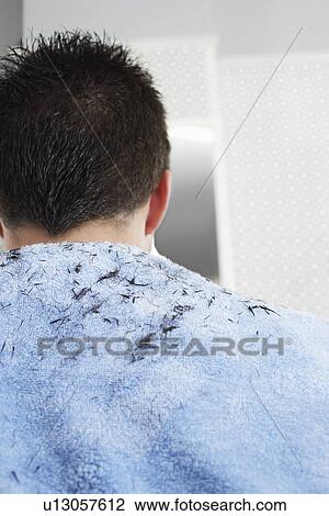 Hair on mans shoulders after haircut at barbers View Large Photo Image Stock Image - Hair on mans shoulders after haircut at barbers. Fotosearch