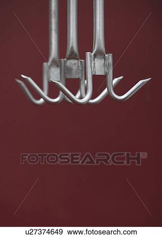 Hanging metal Meat Hooks View Large Photo Image Stock Photo - Hanging metal Meat Hooks. Fotosearch