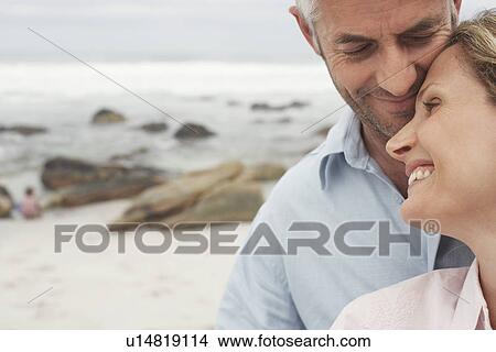 Happy Couple on Beach View Large Photo Image Picture - Happy Couple on Beach. Fotosearch