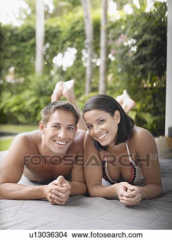 Picture - Happy Young Couple Outdoors. Fotosearch