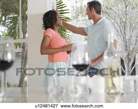 Man and woman talking on patio View Large Photo Image Stock Photo - Man and woman talking on patio. Fotosearch