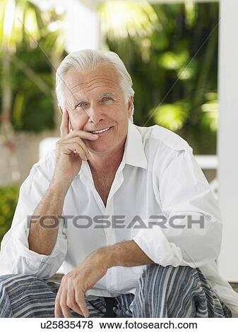 Man sitting on verandah portrait View Large Photo Image Stock Photo - Man sitting on verandah portrait. Fotosearch